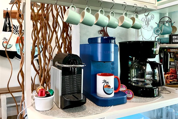 Coffee bar complete with everything you need, including a Nespresso maker with a few starter pods, a Keurig maker with pods, regular coffee maker, and much more! We also supply ground coffee and tea.