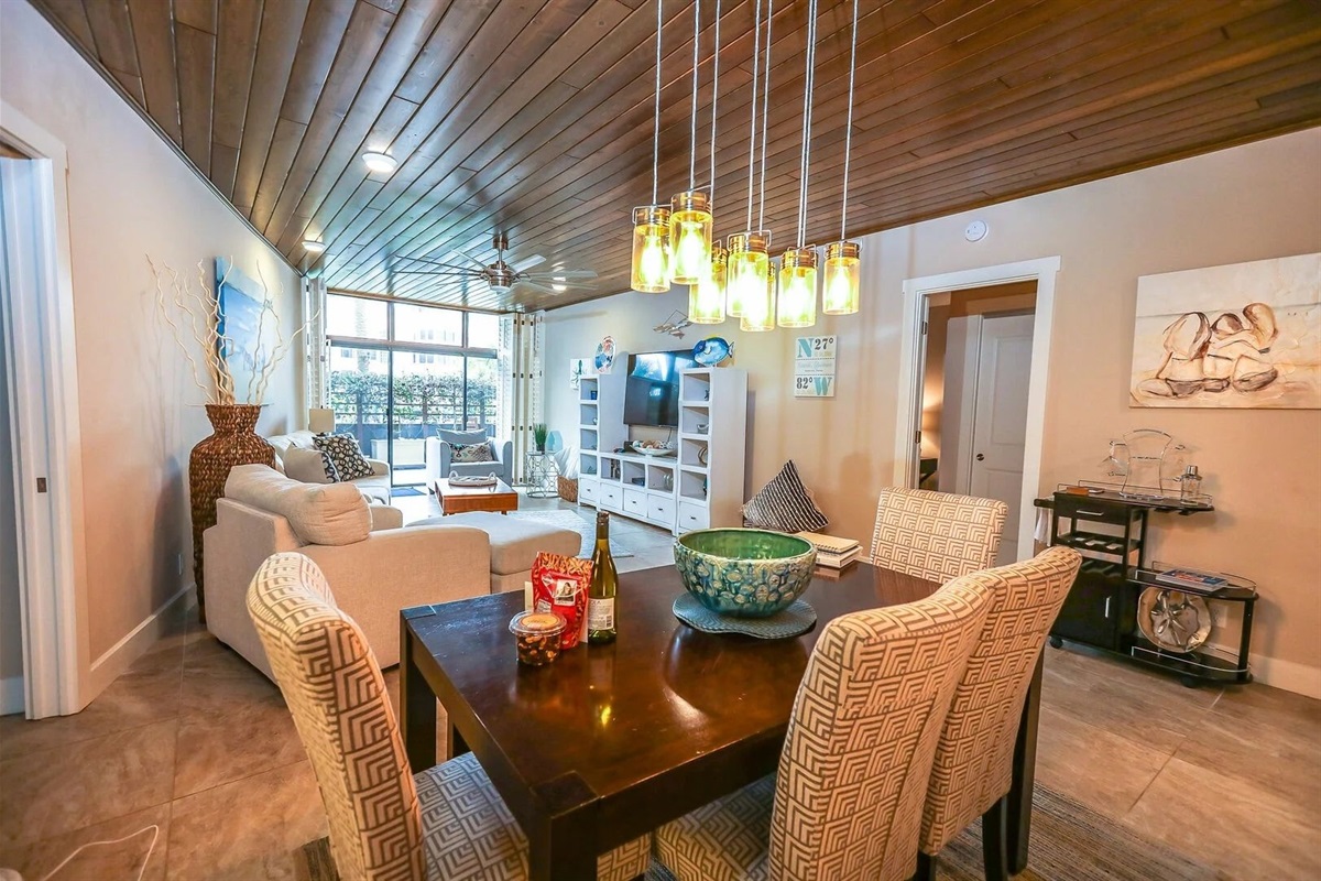 Dining for six beneath the warm tones of natural wood ceilings.