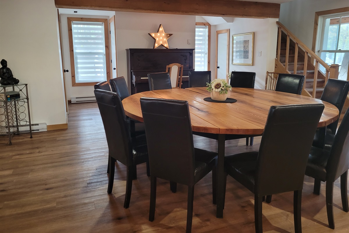 Dining Area view toward stairway to upstairs level; seating for twelve