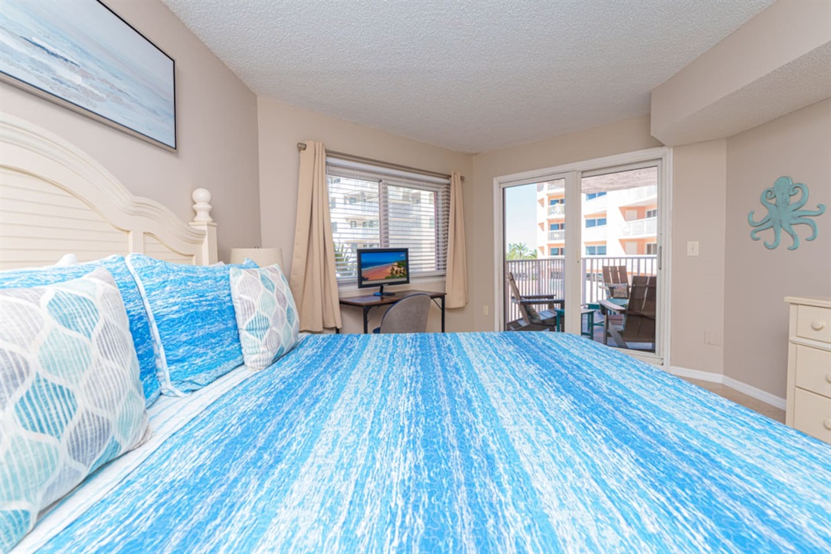 King suite with 50-inch Smart TV and dedicated work space.