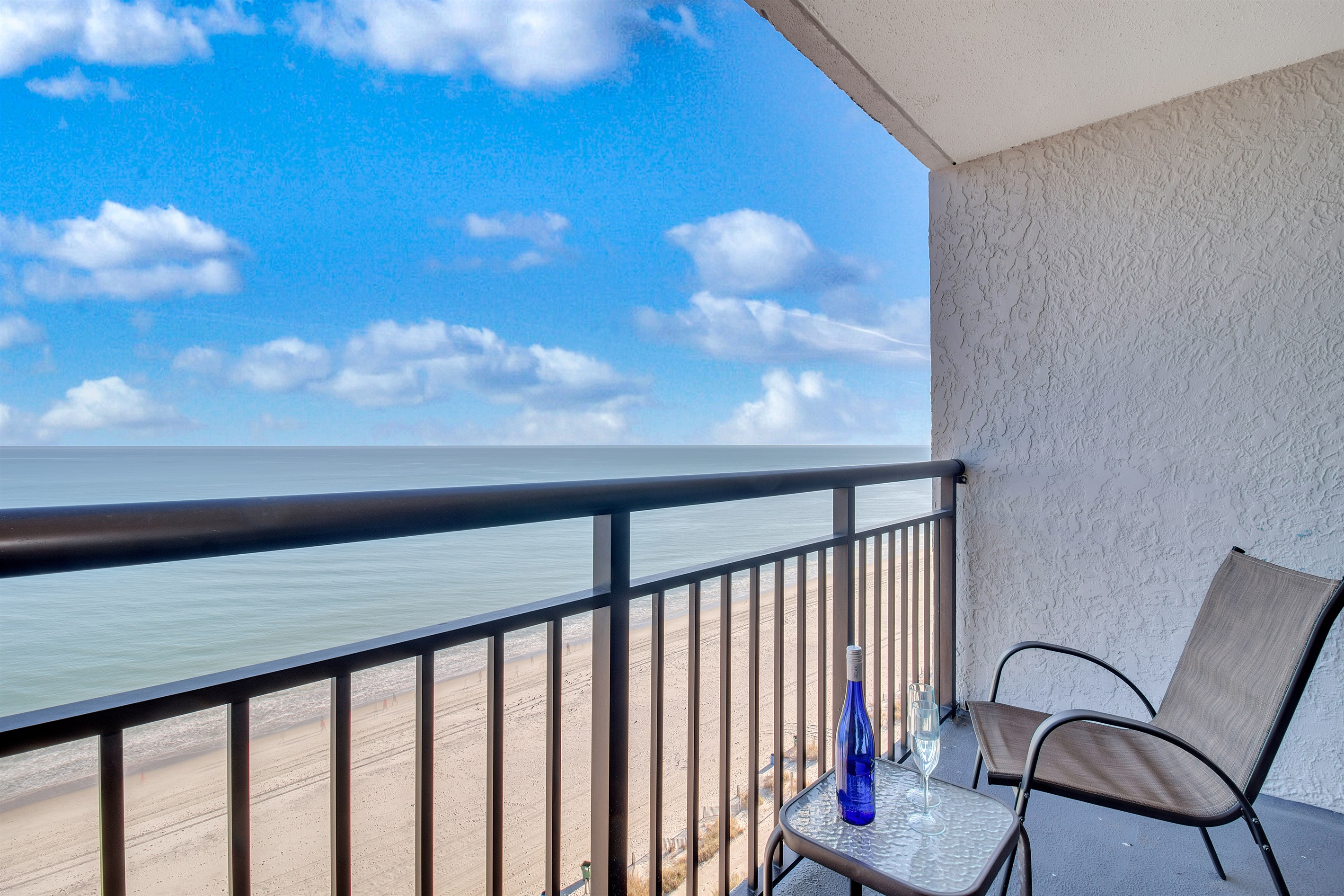 Sit back, relax and sip a cup of coffee while enjoying the front row seat view of the skyblue sea.