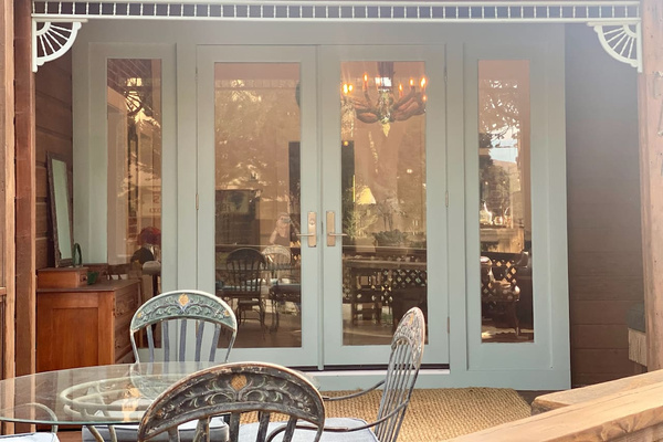 At Heritage House, even the thresholds have a past. Reclaimed from a Beverly Hills mansion, these glass doors now connect the dining room and covered party deck—giving beautiful old craftsmanship new life and gatherings an effortless indoor-outdoor flow.