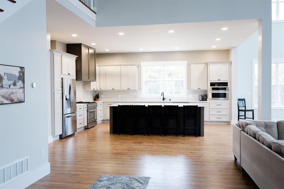 Island seats 5 with an additional two stools in the dining area. Kitchen table upgrade coming soon to accommodate even more guests. Plenty of pantry space, kitchen appliances, dishes, mugs, etc.