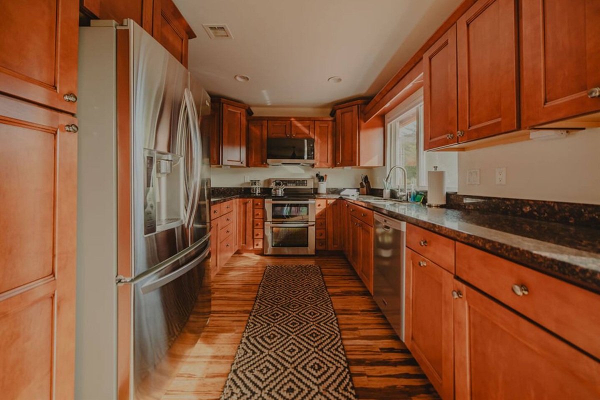 Spacious kitchen layout perfect for cooking, gathering, and entertaining