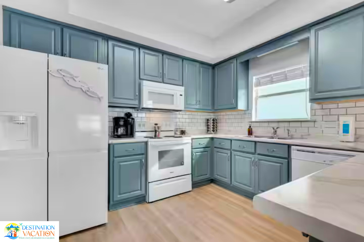 Beautiful cabinetry brings timeless coastal character.