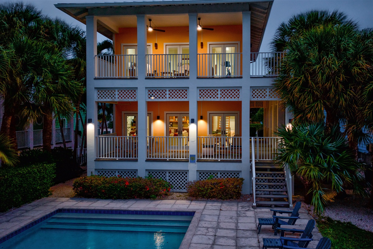 Continue to enjoy the heated pool or hang out on the porch overlooking the pool.