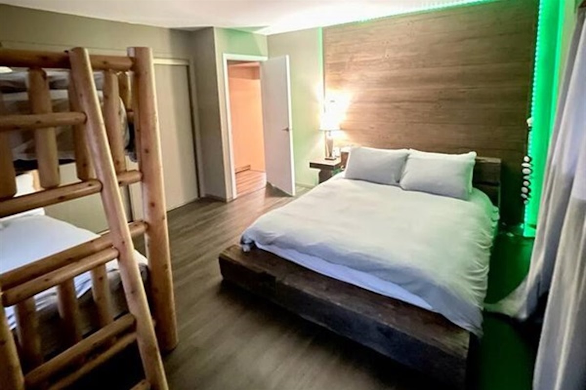 Bedroom with bunk bed and additional sleeping space