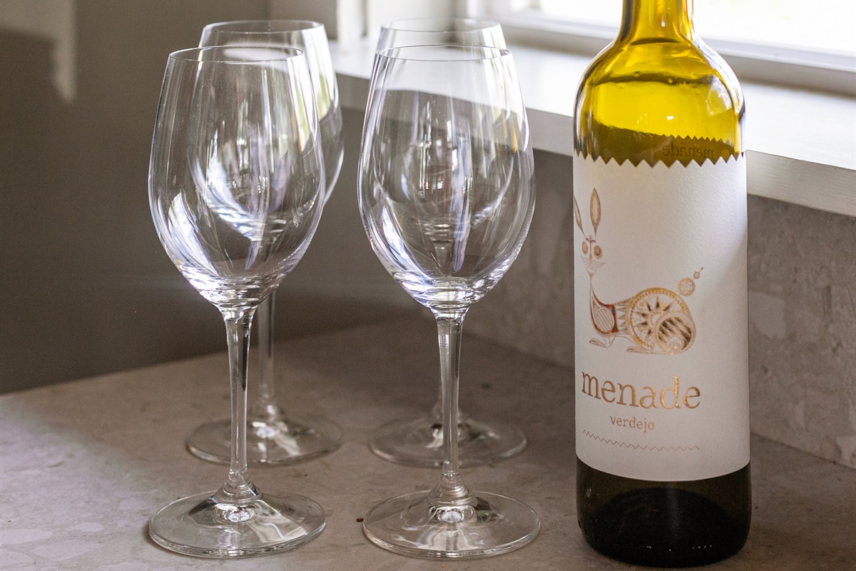 Wine and glasses set the scene for relaxing evenings in style