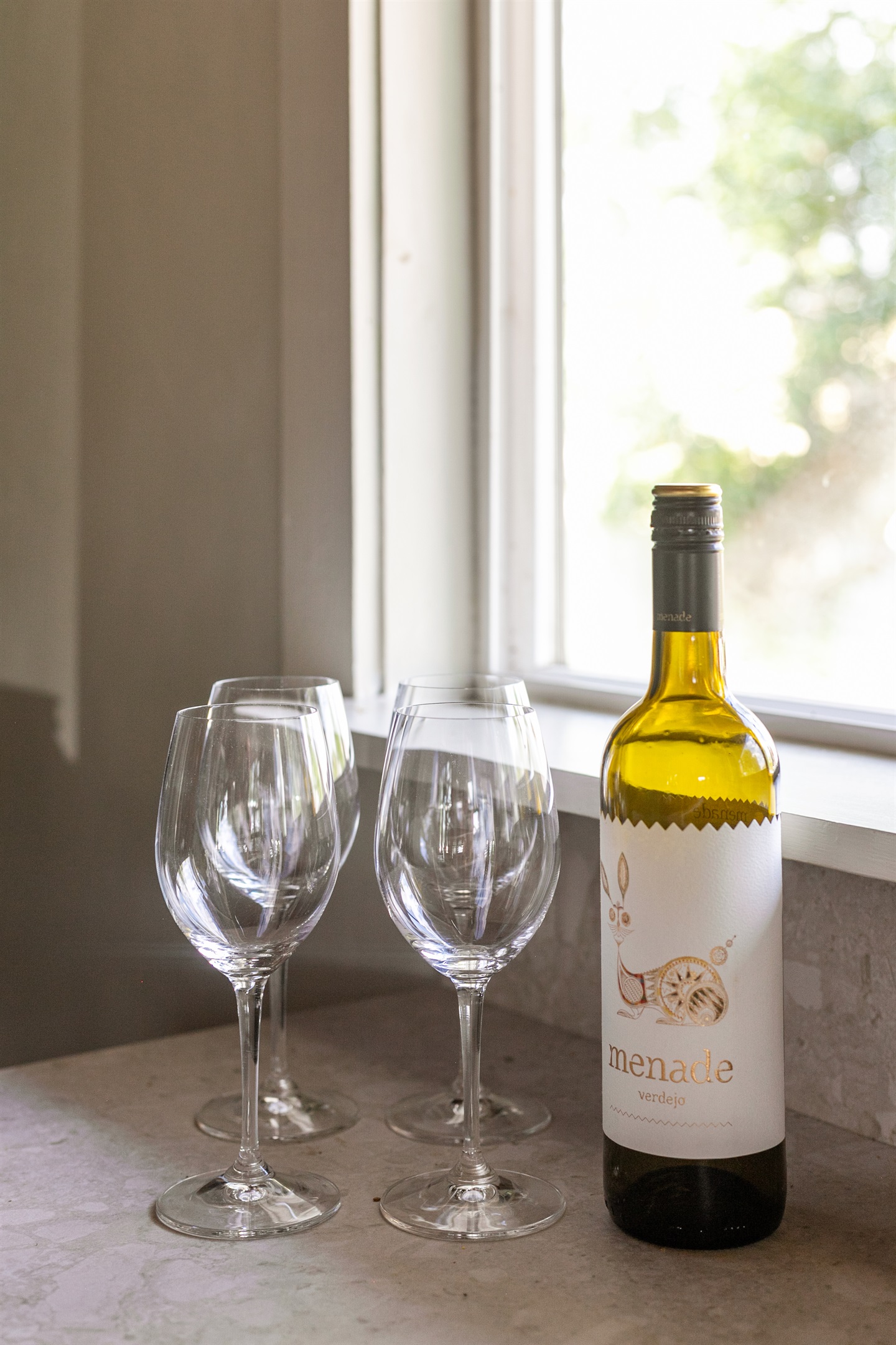 Wine and glasses set the scene for relaxing evenings in style