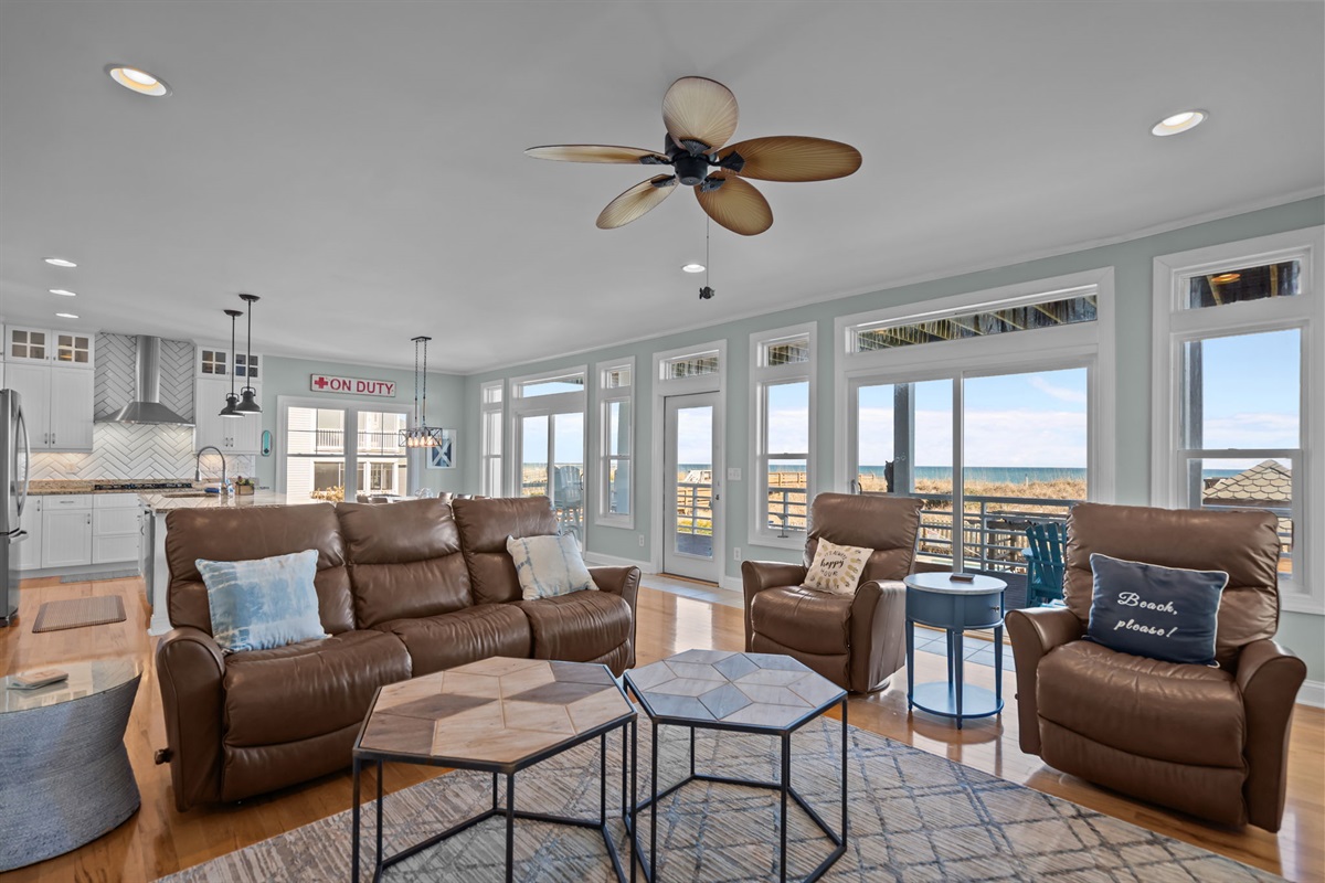 1st floor: Light, bright and airy living room with ocean views and balcony access