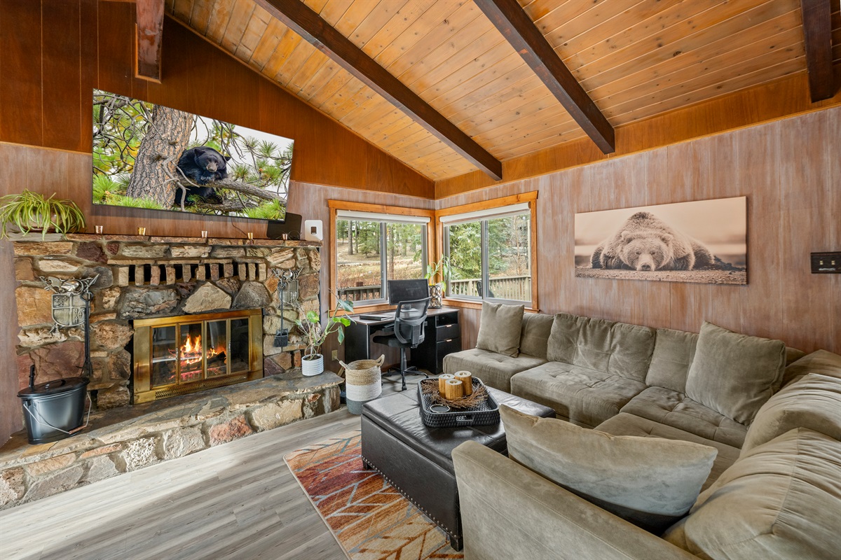 Where rustic charm meets snack-seeking adventures—pull up a stool, warm your toes by the fire, and pretend you’re in your own cabin-themed sitcom.  