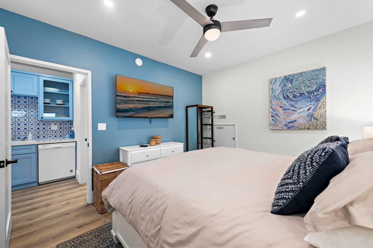 The master bedroom also has a 55" TV with multiple streaming services.