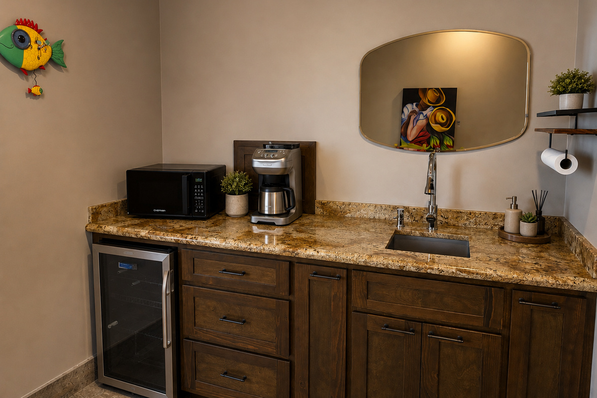 Casita 3: The well-equipped kitchenette includes a sink, coffee maker, microwave, mini refrigerator, and dining table for four.