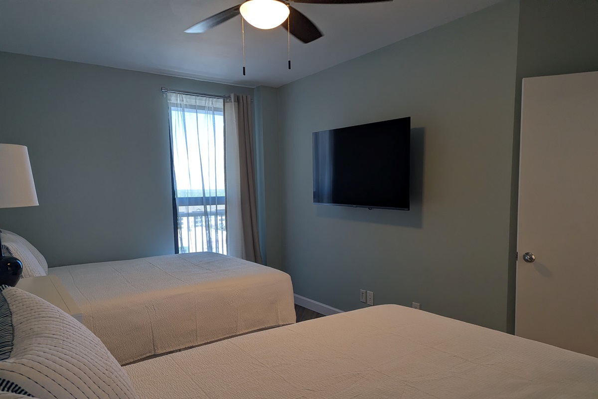 55" Roku TV in the dual queen bedroom