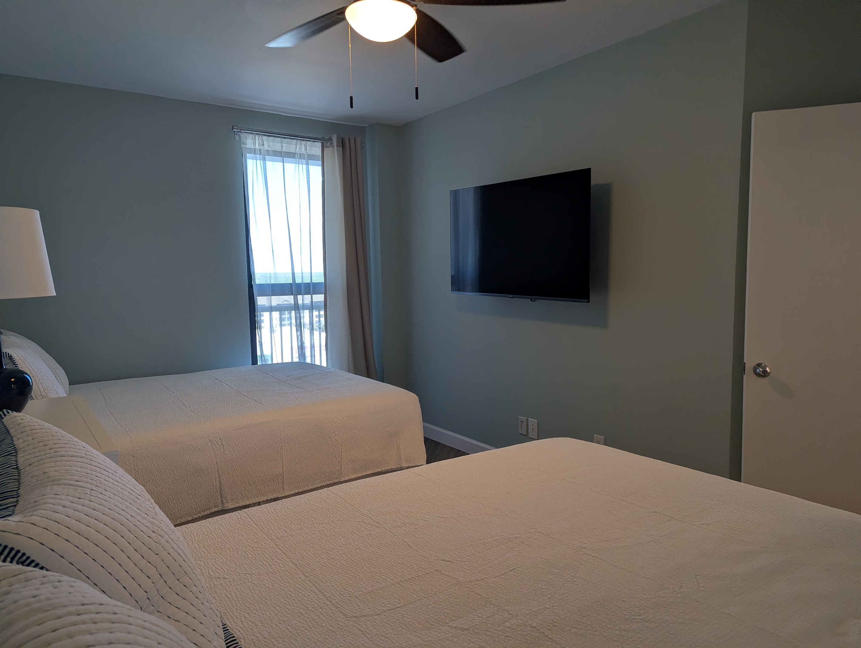 55" Roku TV in the dual queen bedroom