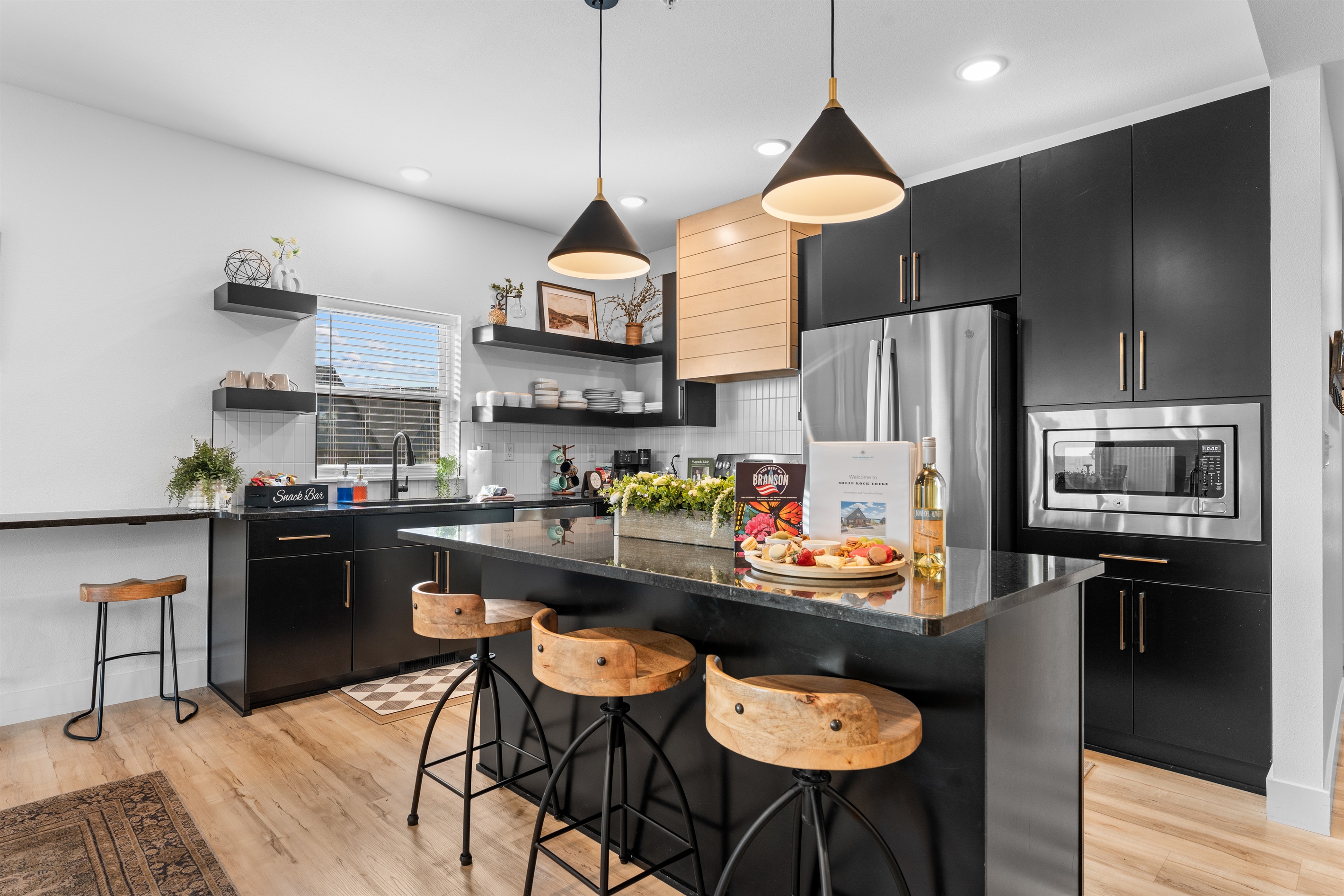 Large kitchen with luxury appliances and plenty of room to hang out together