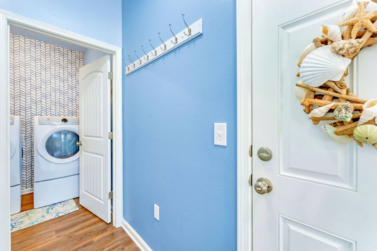 Step inside and feel instantly at home in this bright and inviting beach retreat