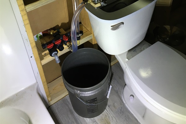 Gravity fed flush toilet.