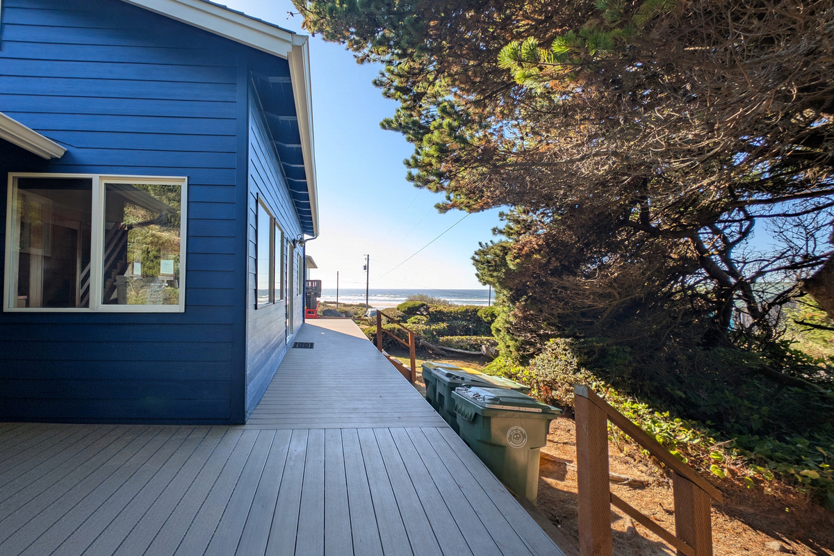 deck on North side of house with sliding glass door to living room