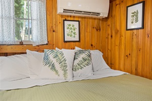 King bed with green linins and bed