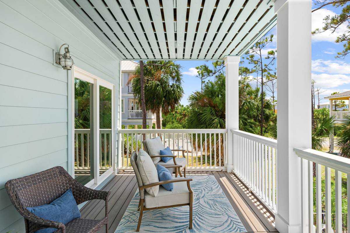 Whether you're reading a book, sharing morning coffee, or simply enjoying the Gulf breeze, this covered balcony invites you to slow down.