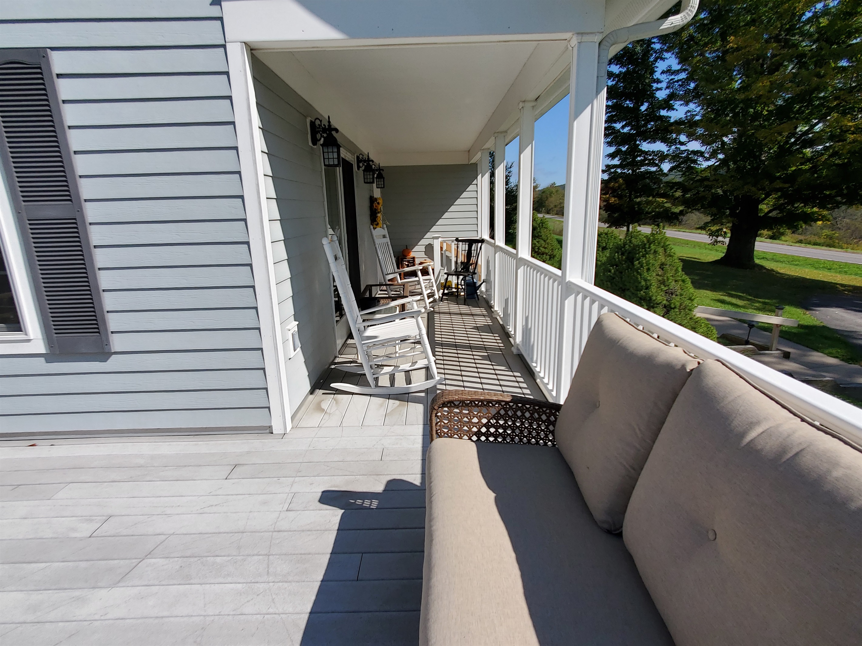 Front porch partially covered.