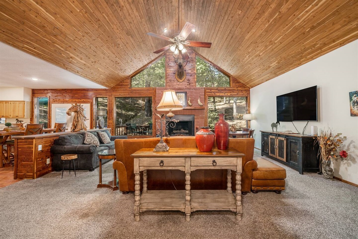 The main living area is in line with the dining and kitchen area so you won't ever be too far away from family. -Living Room from front entryway