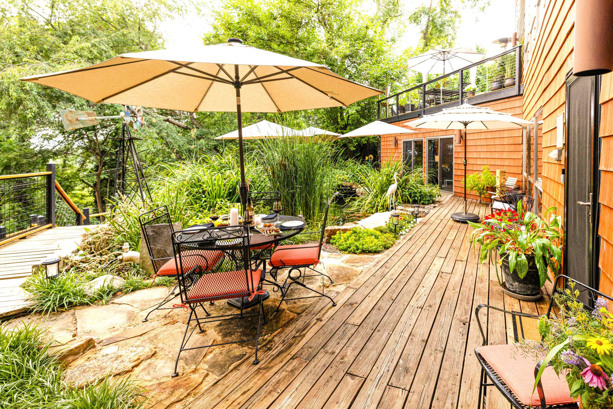 Step outside and enjoy the property views. Visit Henrietta the Heron at her post beside the pond, guarding the colorful Koi gliding below the pond's surface from other heron's and racoons.