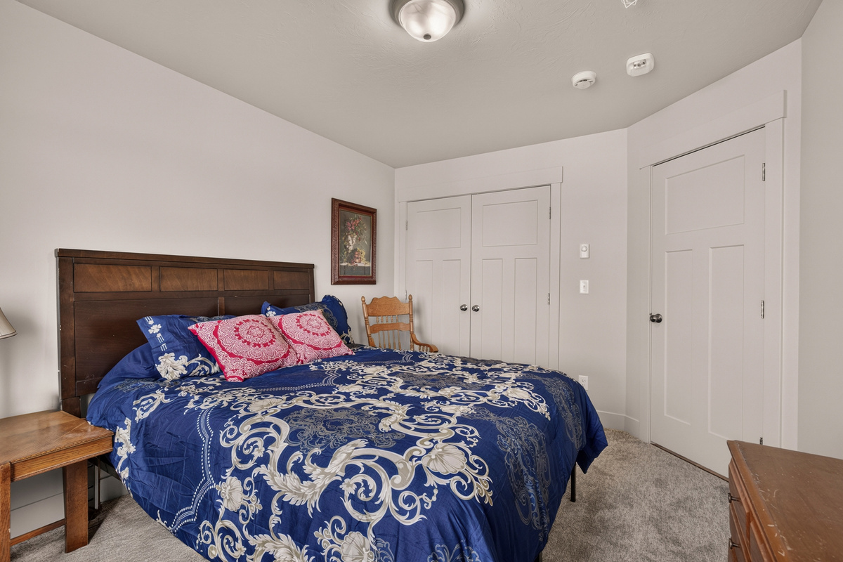Second bedroom with a queen bed.