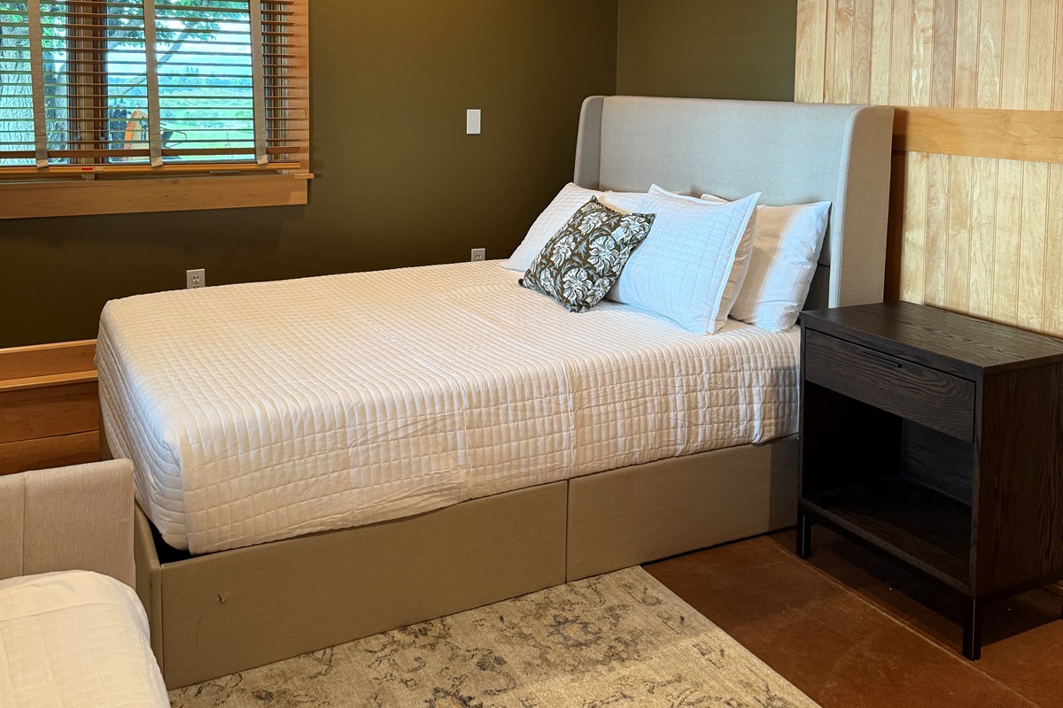 Enjoy the queen bed with memory foam mattress in the second bedroom on the main level. We are adding a TV in the coming days, so you can snuggle up in bed to watch a late night movie.