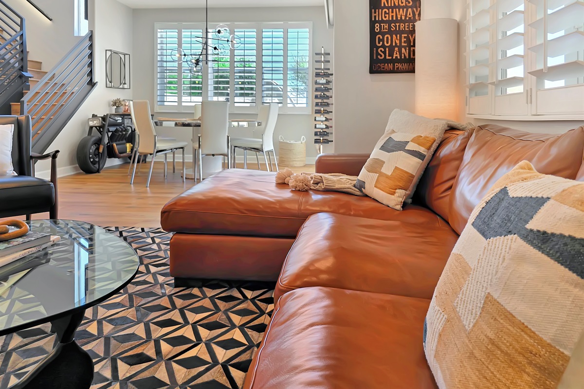 The floor plan features windows throughout for tons of natural light.