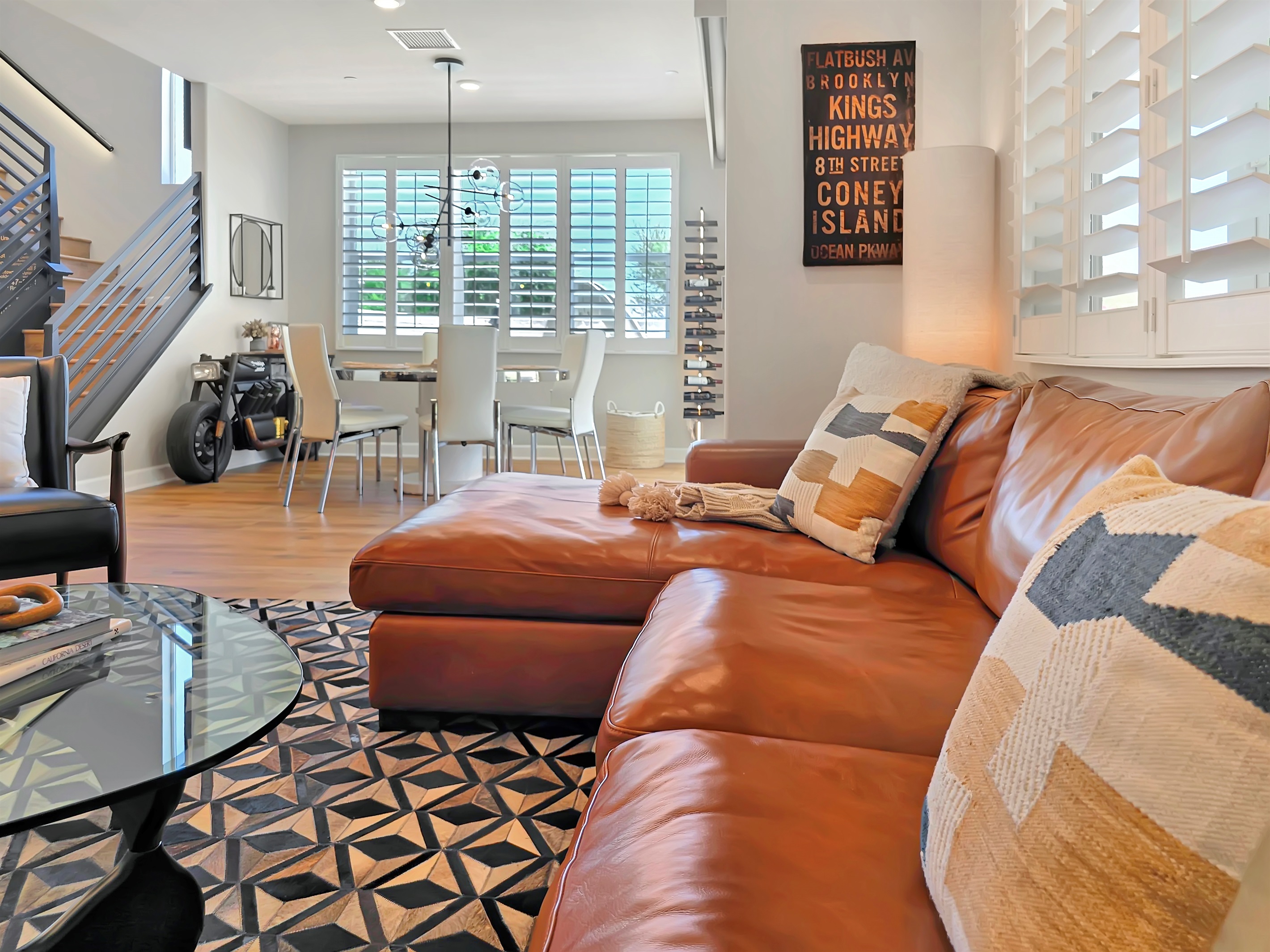 The floor plan features windows throughout for tons of natural light.