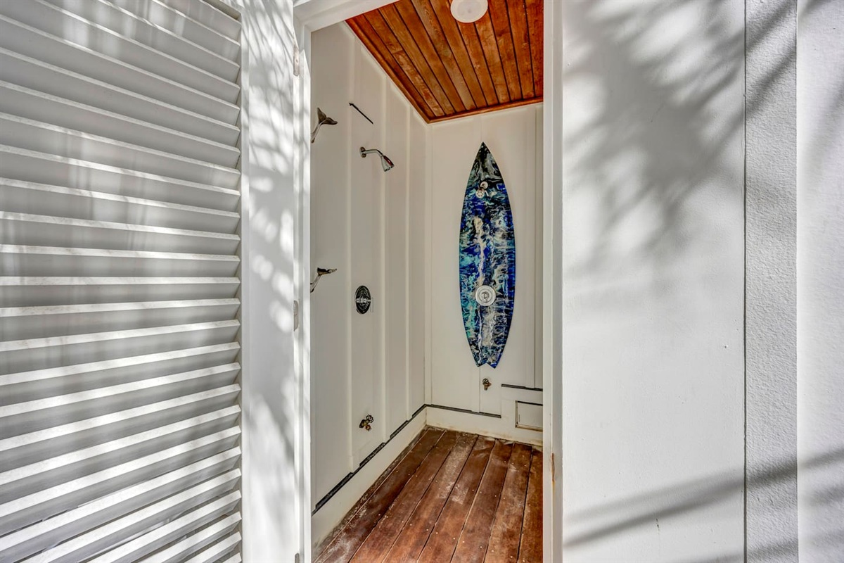 Outdoor shower - located along left side of garage