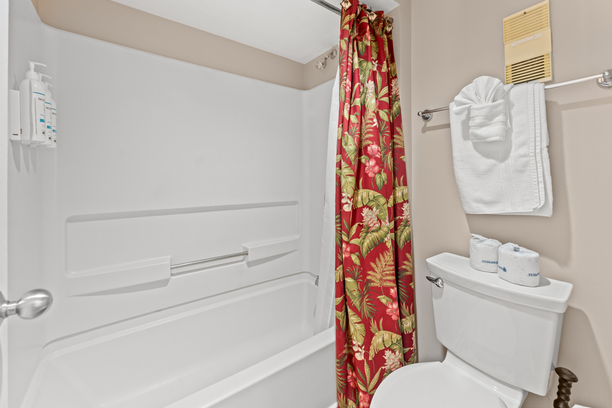 Main Bathroom with double sinks and tub/shower combo