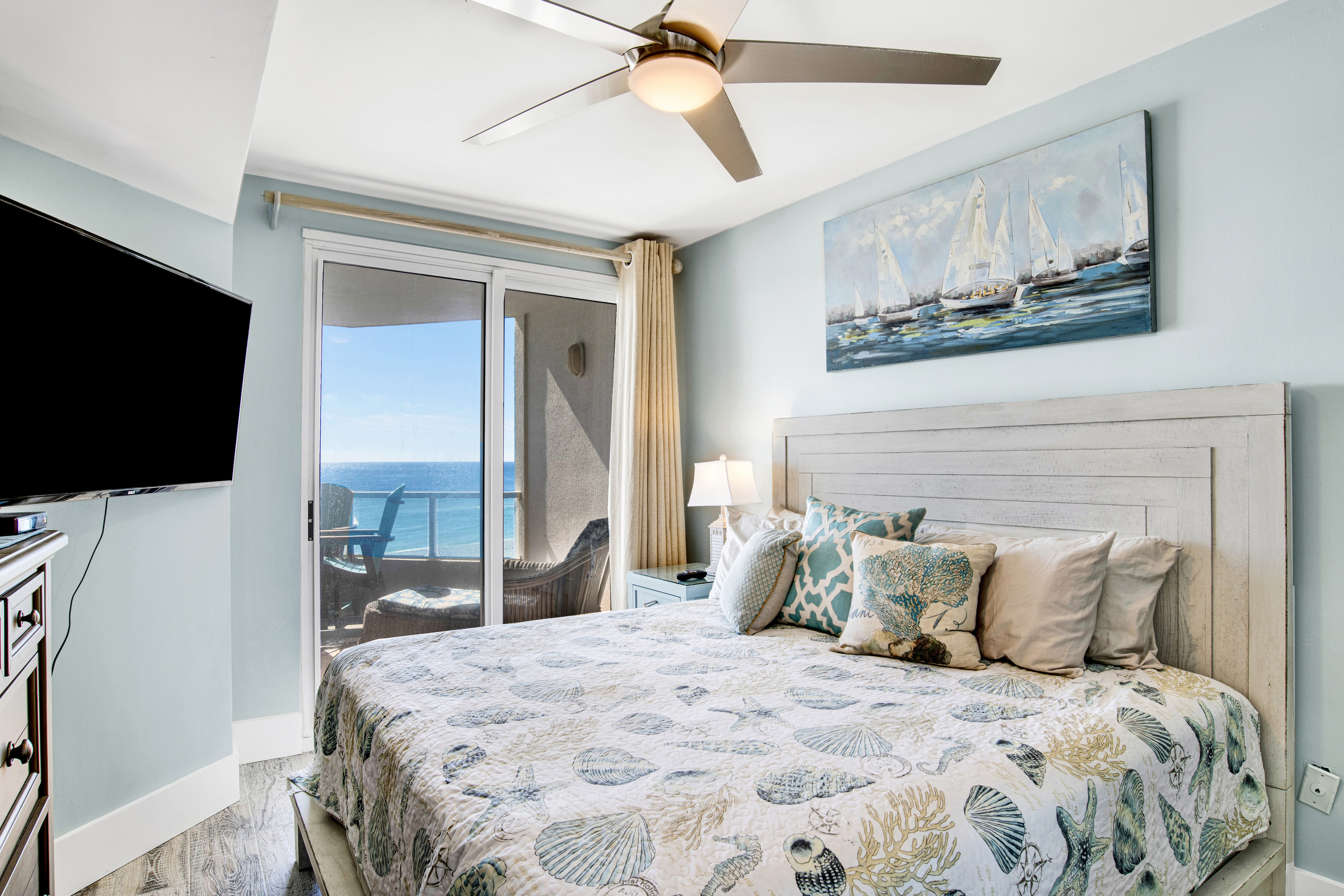 Primary Bedroom with a king bed and balcony access