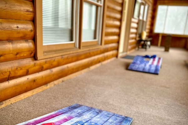 Unwind on our spacious covered porch, complete with Giant Jenga and cornhole! Perfect for friendly competitions or casual hangouts, this outdoor space invites fun and relaxation. Enjoy making lasting memories with friends and family!