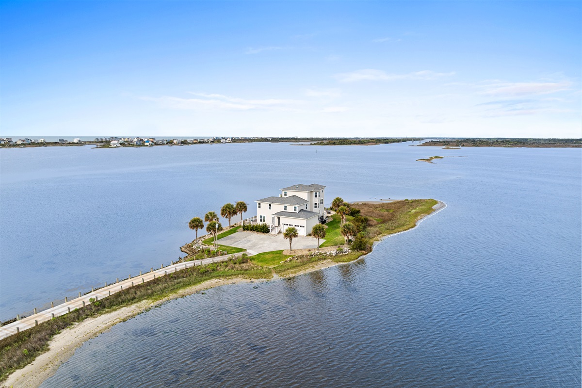 Exclusive waterfront retreat tucked away on its own private stretch of shoreline