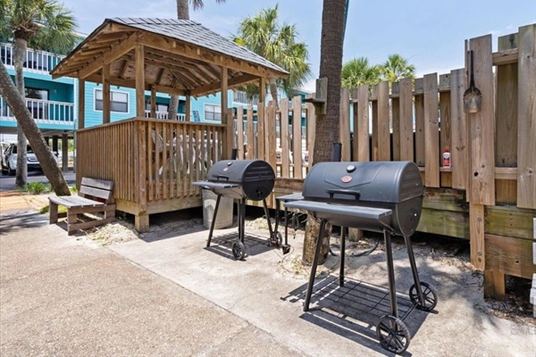 Charcoal Grills by the pool.