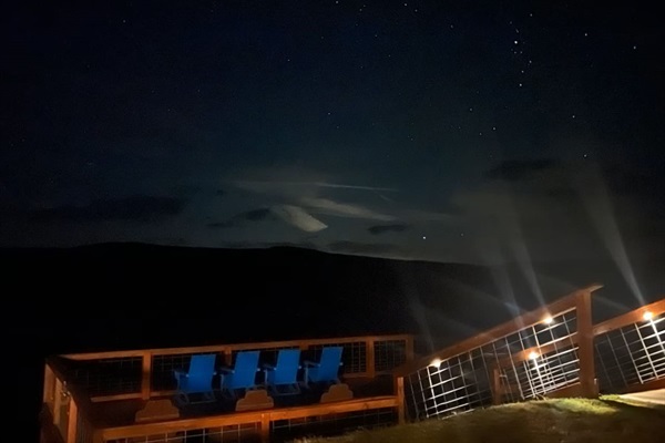 Stargazing from the deck—no city lights, just sky and silence.