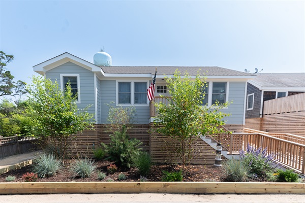 Front of house - close to beach and town. Easy access ramp up to pool deck.