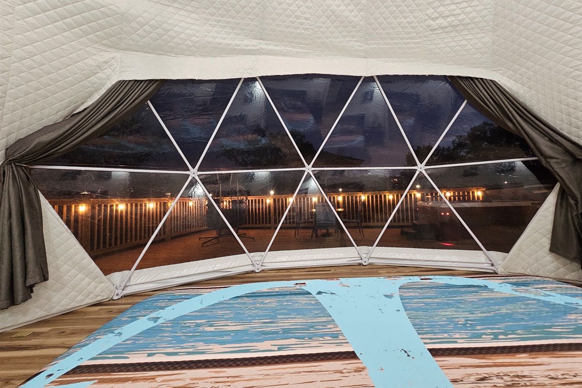 Fall asleep under the stars with panoramic nighttime views from the comfort of your king bed