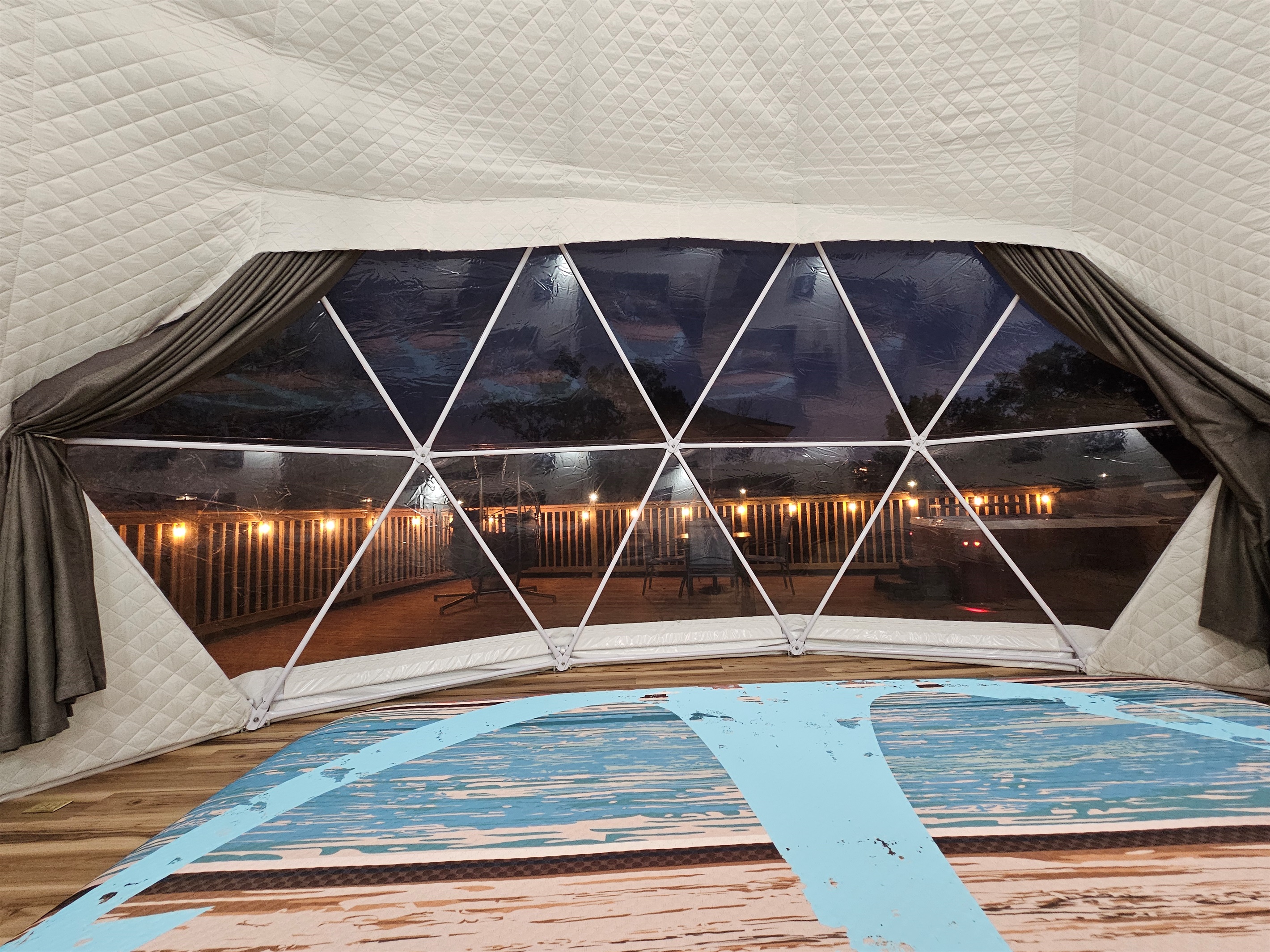 Fall asleep under the stars with panoramic nighttime views from the comfort of your king bed