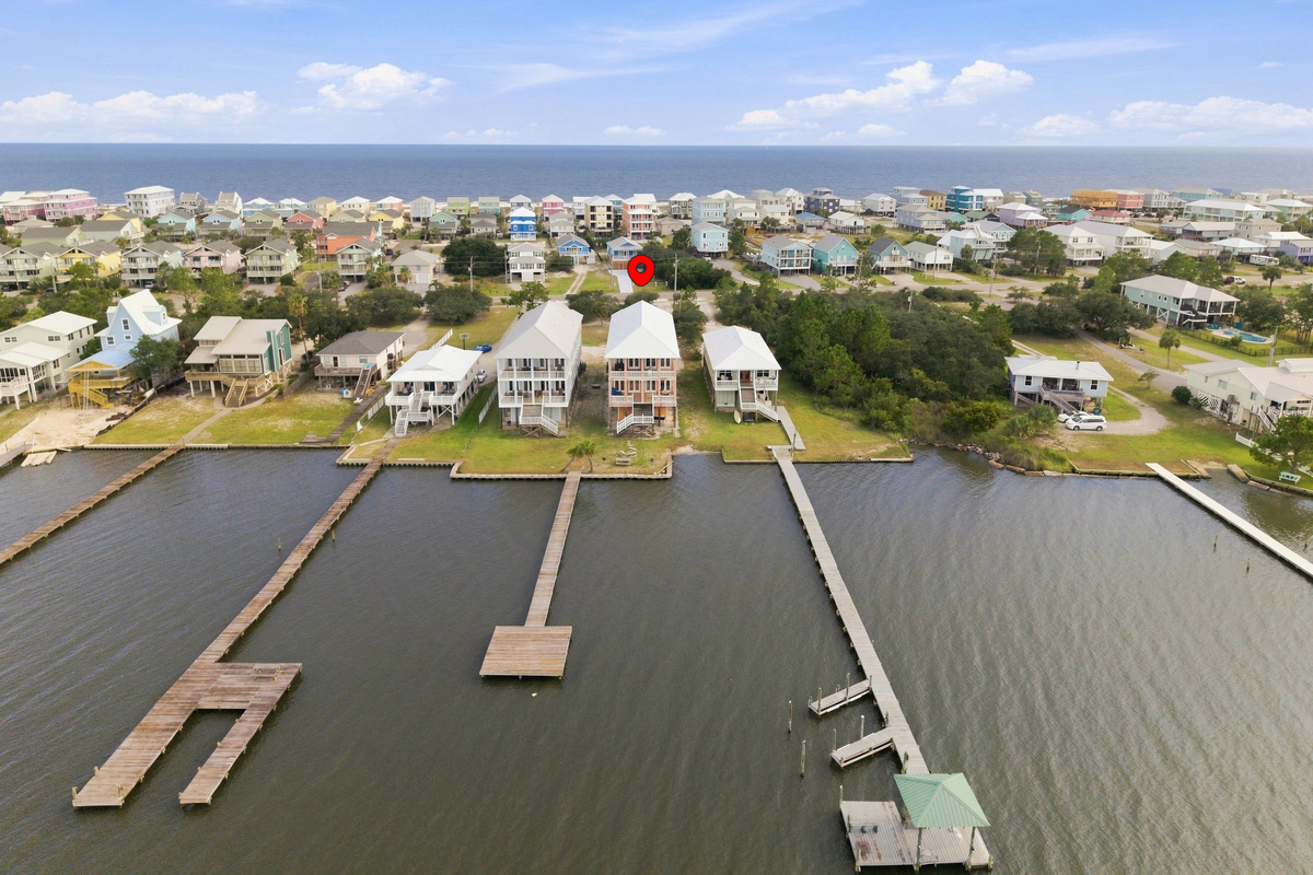 Aerial of the lagoon shoreline lined with private docks