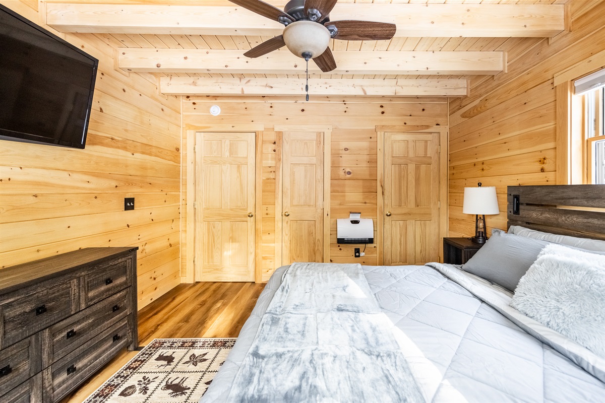 1st bedroom with King bed and attached 1/2 bath