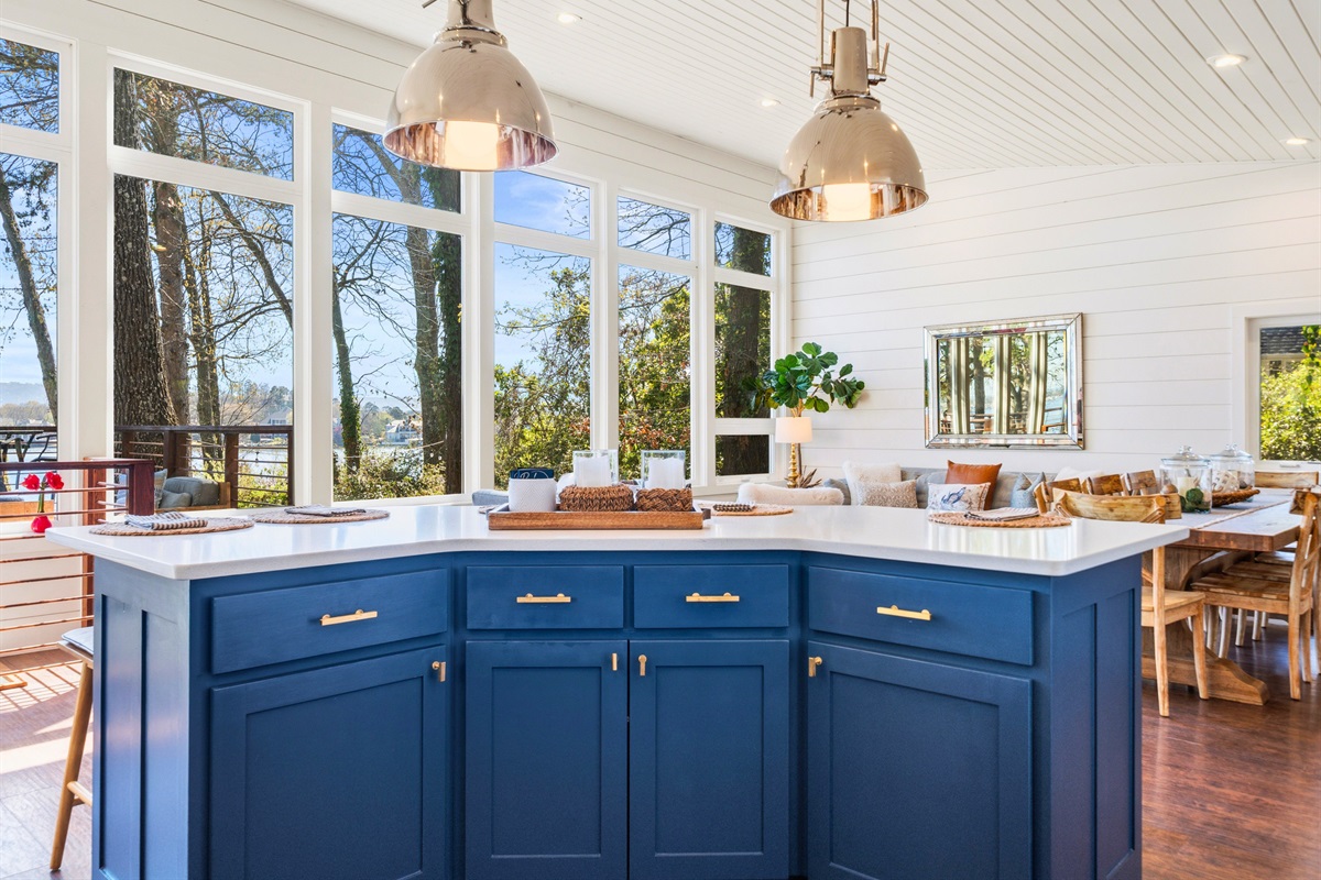 Gather around the kitchen island where extra seating creates the perfect spot for casual meals or morning coffee.