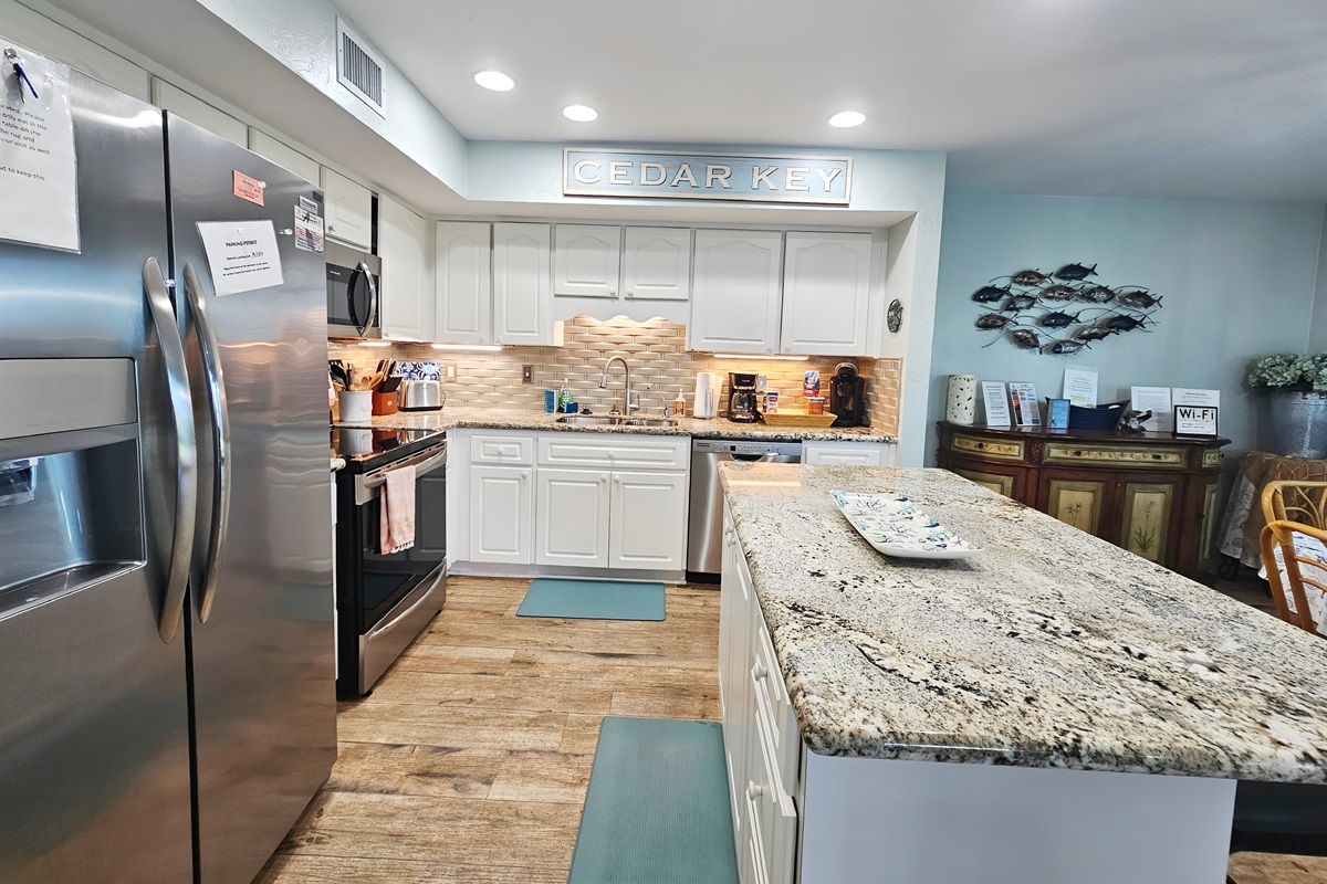 Full Kitchen Stocked with Dishware and Coffee