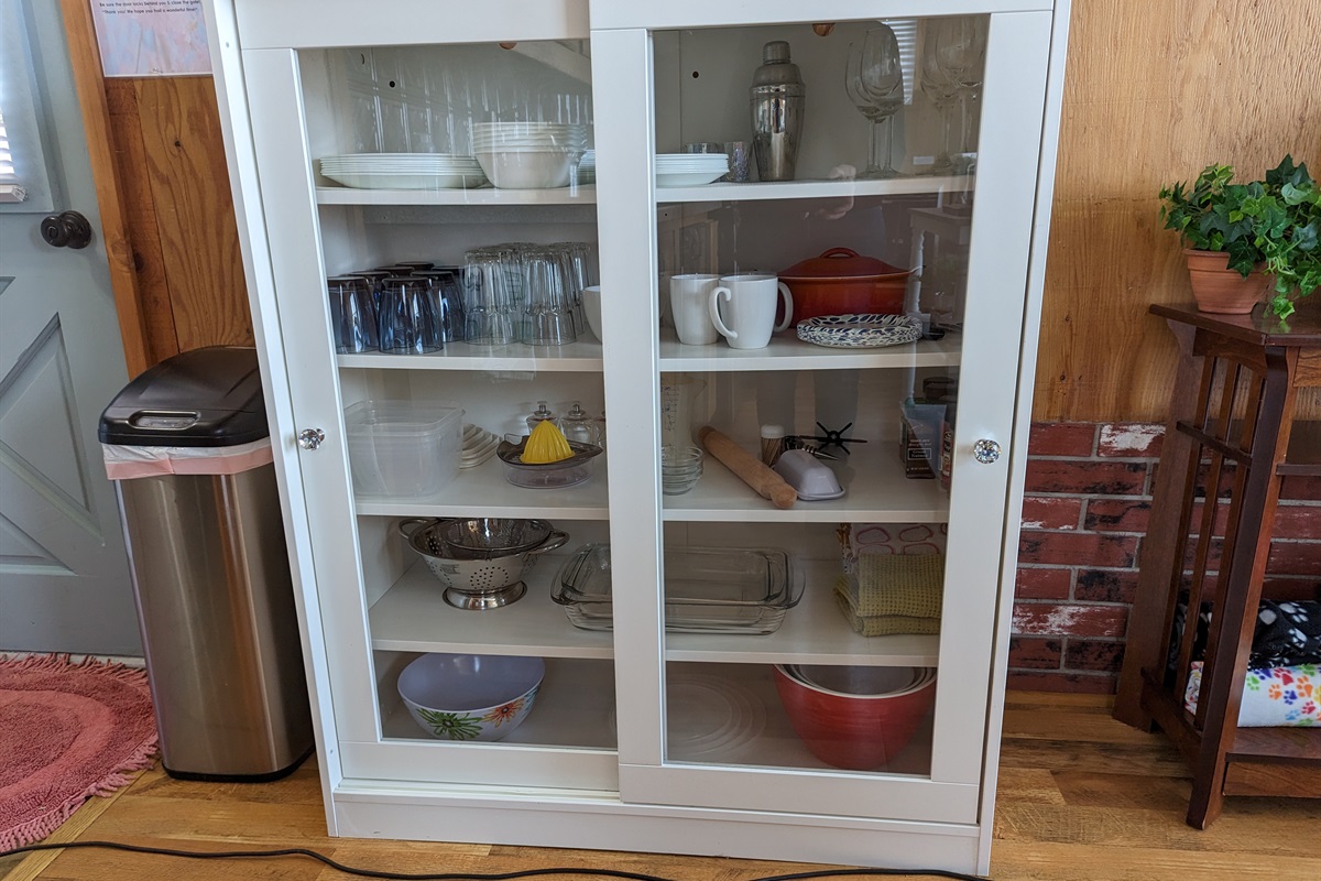 Cabinet dishes & kitchen items.