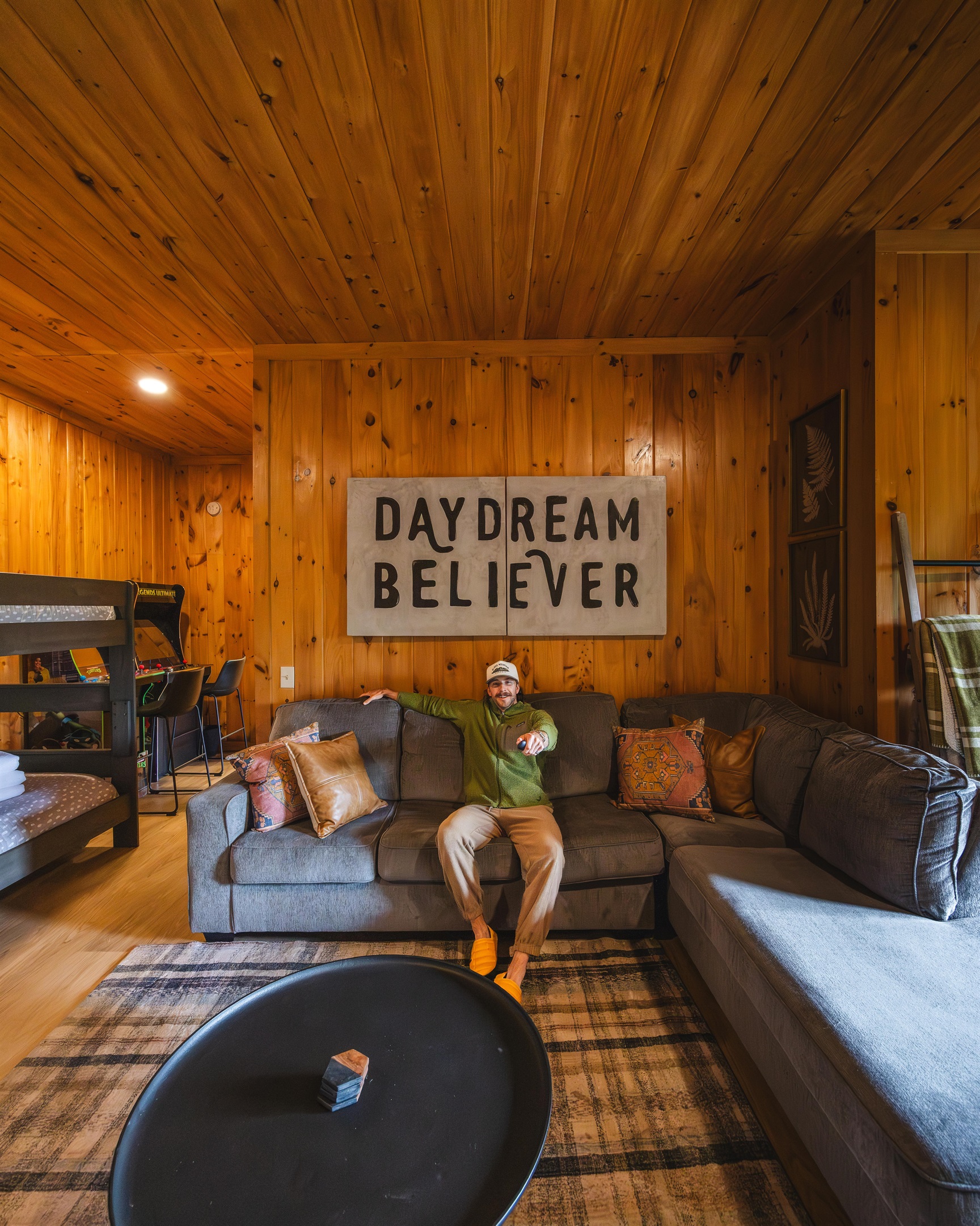 Kick back on the cozy sectional, press play, and settle in for a movie night in the mountains.
