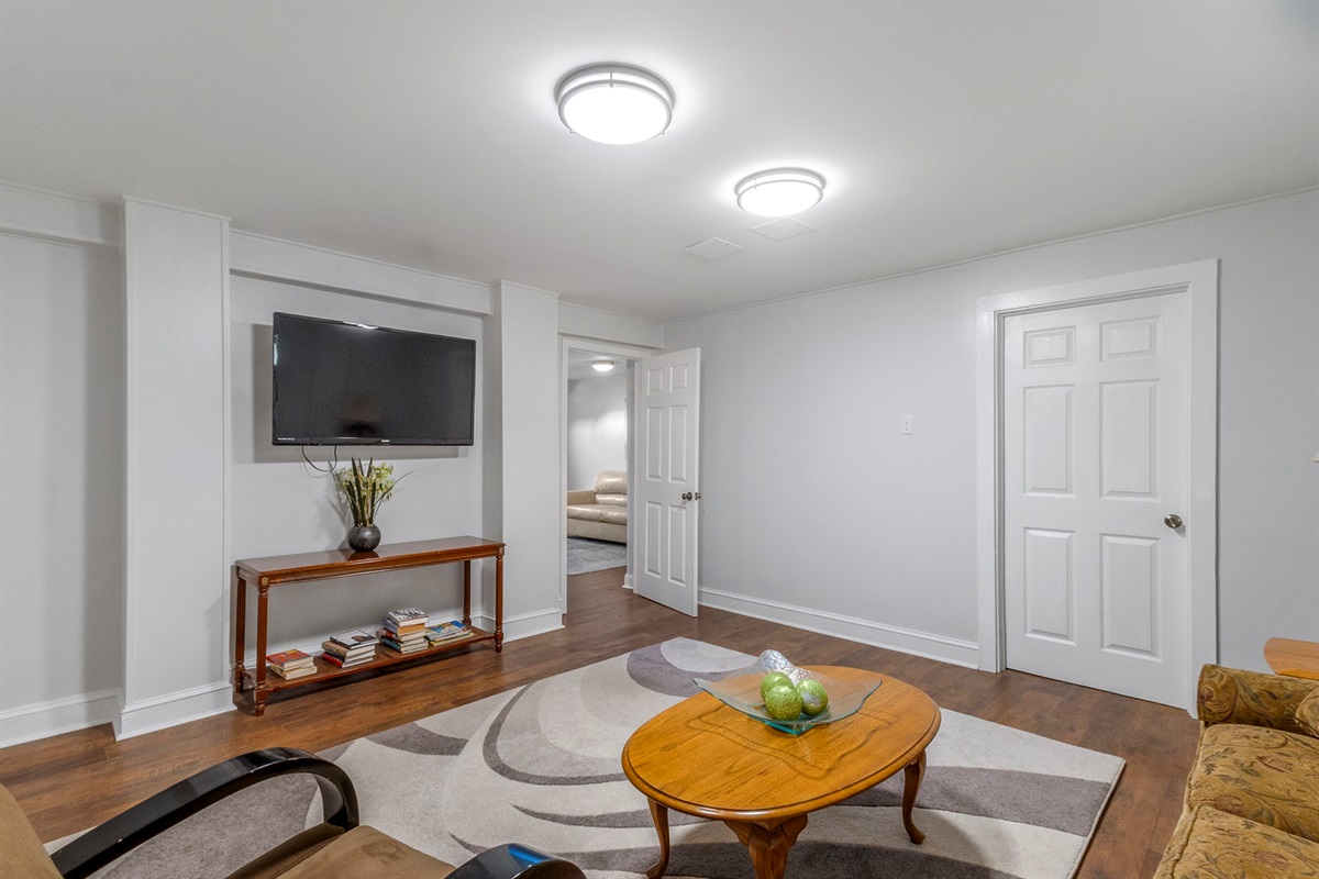 Bonus downstairs tv room with pull out couch. This is a great place to put on a movie for the kids.
