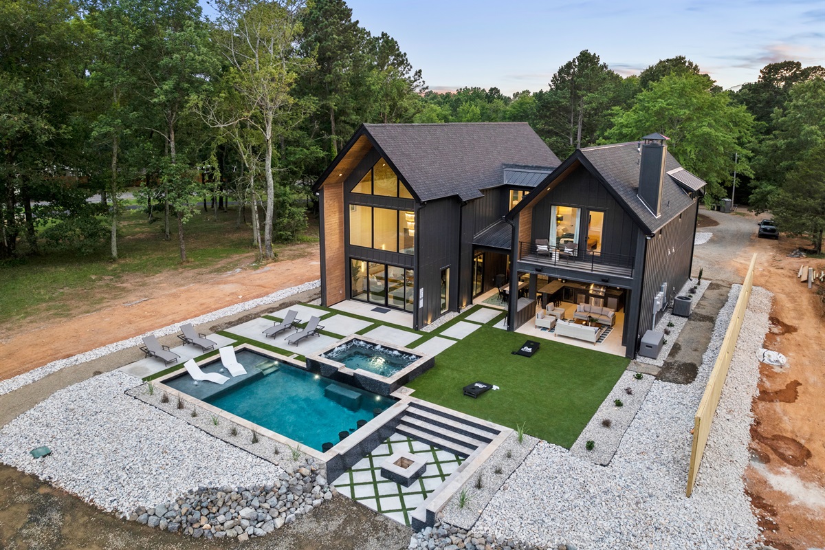 Discover the spacious and inviting outdoor areas of this stunning retreat, designed for ultimate comfort.